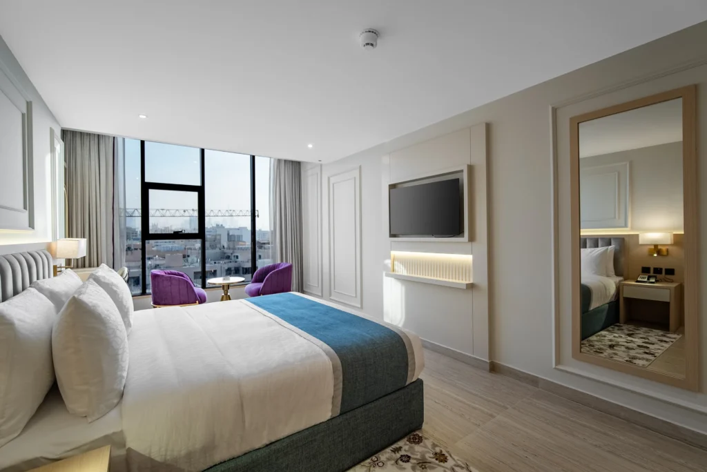 Deluxe Suite with a separate living area with a sofa
